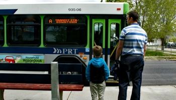 Riders wait to board a Pocatello Regional Transit bus. 