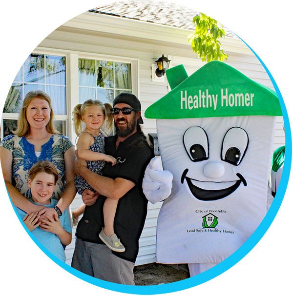 Happy family with lead-free home standing next to Healthy Homer